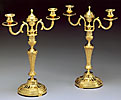 A splendid pair of Louis XVI gilt bronze candelabra